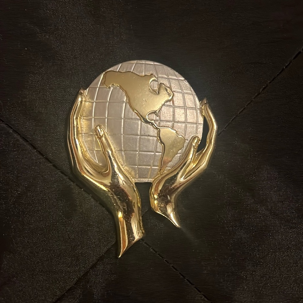 World in your hands pin